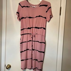 Rose pink with a black stripe T-shirt style short dress with elastic waist. SzL